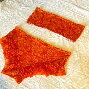 Two piece peach color lace lingerie set Size L. Never worn.